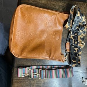 Adhorned camel messenger bag with 2 strap gold color hardware.